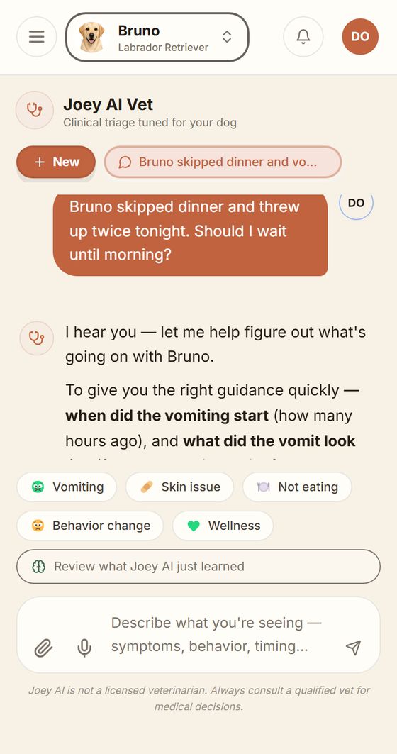The Joey AI Vet chat in the app: an owner asks whether Bruno, a Labrador who skipped dinner and vomited twice, can wait until morning, and Joey replies asking when the vomiting started and what it looked like.
